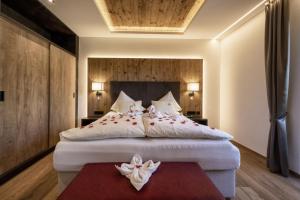 Tempat tidur dalam kamar di Vitalhotel Sonnenhof