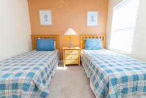 Ein Bett oder Betten in einem Zimmer der Unterkunft Private Pool Homes