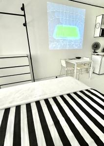 TV a/nebo společenská místnost v ubytování 2D Apartment
