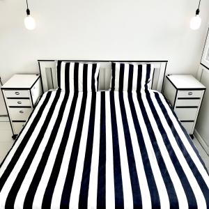 Postel nebo postele na pokoji v ubytování 2D Apartment + 13 fotografií