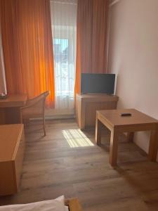 TV a/nebo společenská místnost v ubytování City Hotel Post 15