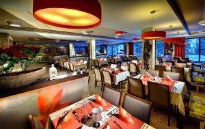 A restaurant or other place to eat at Wellness Hotel Chopok