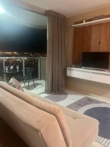 Et opholdsområde på O melhor! Ap Luxo em shopping