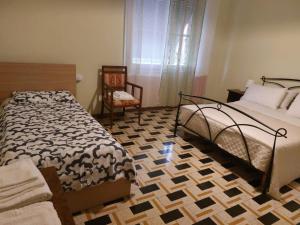 Postel nebo postele na pokoji v ubytování Villa Mehari