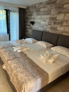 Postel nebo postele na pokoji v ubytování Hotel Selena Boutique