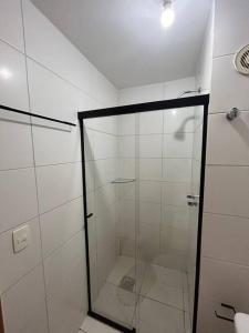 a shower with a glass door in a bathroom at Pôr do Sol DF Plaza in Brasília +35 photos
