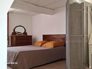 Postel nebo postele na pokoji v ubytování Gîte Les Fourches