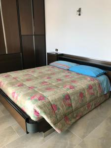 Postel nebo postele na pokoji v ubytování Casa ex bar Fiolet
