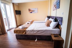 Postel nebo postele na pokoji v ubytování Villa Irina