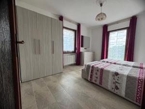 Postel nebo postele na pokoji v ubytování Casa ex bar Fiolet