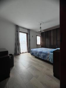 Postel nebo postele na pokoji v ubytování Casa ex bar Fiolet