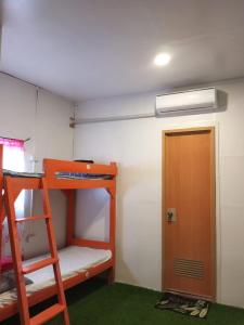 Voodi või voodid majutusasutuse el nido hostel sun valley toas