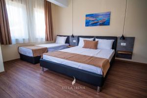 Postel nebo postele na pokoji v ubytování Villa Irina