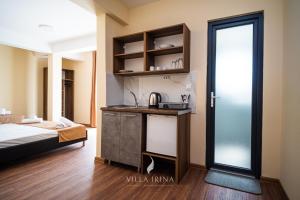 Postel nebo postele na pokoji v ubytování Villa Irina