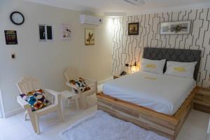 Postel nebo postele na pokoji v ubytování Hotel1325