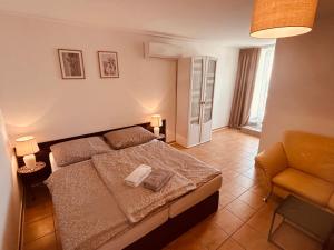 Ένα ή περισσότερα κρεβάτια σε δωμάτιο στο Apartments ZARA +63 φωτογραφίες