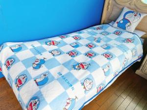 Postel nebo postele na pokoji v ubytování 颯House5