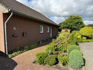 En have udenfor Ferienhaus Gisela - Ganzes Haus - Haustiere Willkommen - Hage - Nordsee