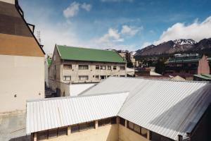 an overhead view of a city with buildings and mountains at Gente del Sur - Towers in Ushuaia