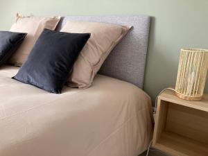 Ένα ή περισσότερα κρεβάτια σε δωμάτιο στο La Lys Martagon