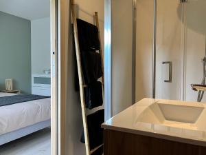 Ένα ή περισσότερα κρεβάτια σε δωμάτιο στο La Lys Martagon +1 φωτογραφίες