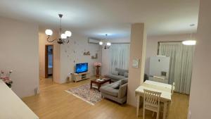 TV/trung tâm giải trí tại Urban Heaven Apartment