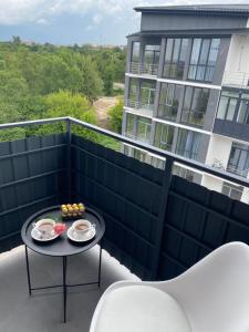 リウネにあるАпартаменти на Чорновола,поруч Щасливеのバルコニー(テーブル、食器付) +7枚の写真