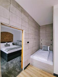 Posteľ alebo postele v izbe v ubytovaní Apartamenty "BULWAR GORZOW"