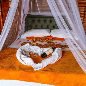 Postel nebo postele na pokoji v ubytování Glamping Mirador Santa Fe-Sopetran + 37 fotografií