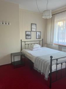 Posteľ alebo postele v izbe v ubytovaní Noclegi Gabi