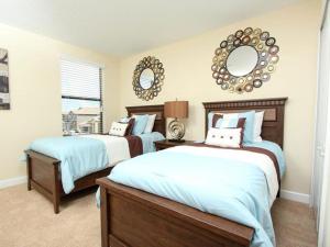 Ein Bett oder Betten in einem Zimmer der Unterkunft Private Pool Homes