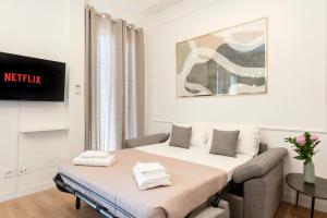 Μια τηλεόραση ή/και κέντρο ψυχαγωγίας στο White Flat 60 -San Lorenzo-