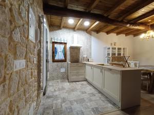 Køkken eller tekøkken på Casa Rural Rio la Puente + 18 billeder