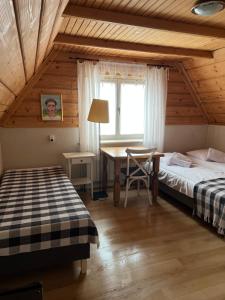 Posteľ alebo postele v izbe v ubytovaní Noclegi Gabi