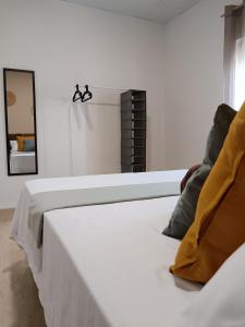Postel nebo postele na pokoji v ubytování Casa Pili
