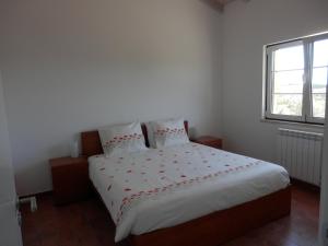 Postel nebo postele na pokoji v ubytování Monte da Ameira