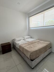 Postel nebo postele na pokoji v ubytování Penthouse + Jacuzzi privado en Anapoima.