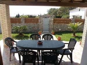 Patio alebo iná vonkajšia časť ubytovania Casas Elena-Conil