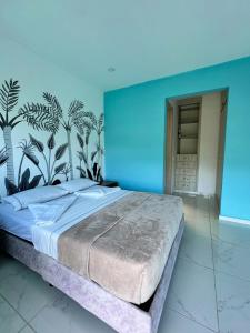 Postel nebo postele na pokoji v ubytování Penthouse + Jacuzzi privado en Anapoima.