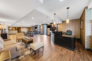 a living room with a couch and a table at Best Western Inn of Del Rio in Del Rio