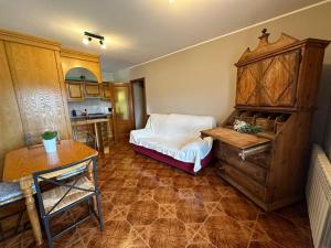 a room with a bed and a table in it at Casa Costa Laspaúles in Laspaúles