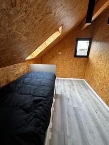 A bed or beds in a room at Enzojo 2