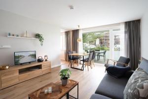 TV a/nebo společenská místnost v ubytování ABS-012-Bergstrasse