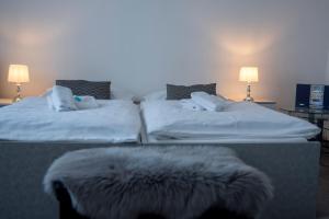 Postel nebo postele na pokoji v ubytování CLASSIC apartmány Třinec