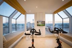 Televízia a/alebo spoločenská miestnosť v ubytovaní Vienna Grand Apartments DANUBE