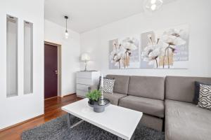 Posezení v ubytování River Apartments
