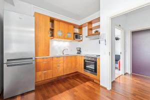 Kuchyň nebo kuchyňský kout v ubytování River Apartments