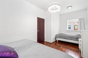 Postel nebo postele na pokoji v ubytování River Apartments