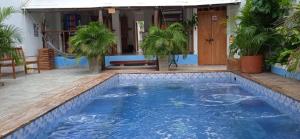 Bazén v ubytování HOSTAL LA BOQUILLA nebo v jeho okolí