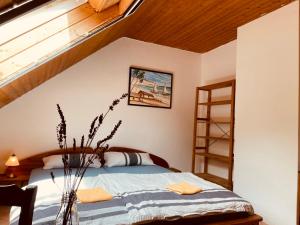 a bedroom with a bed in a attic at Odw homes - Functional workers apartment in Weinheim